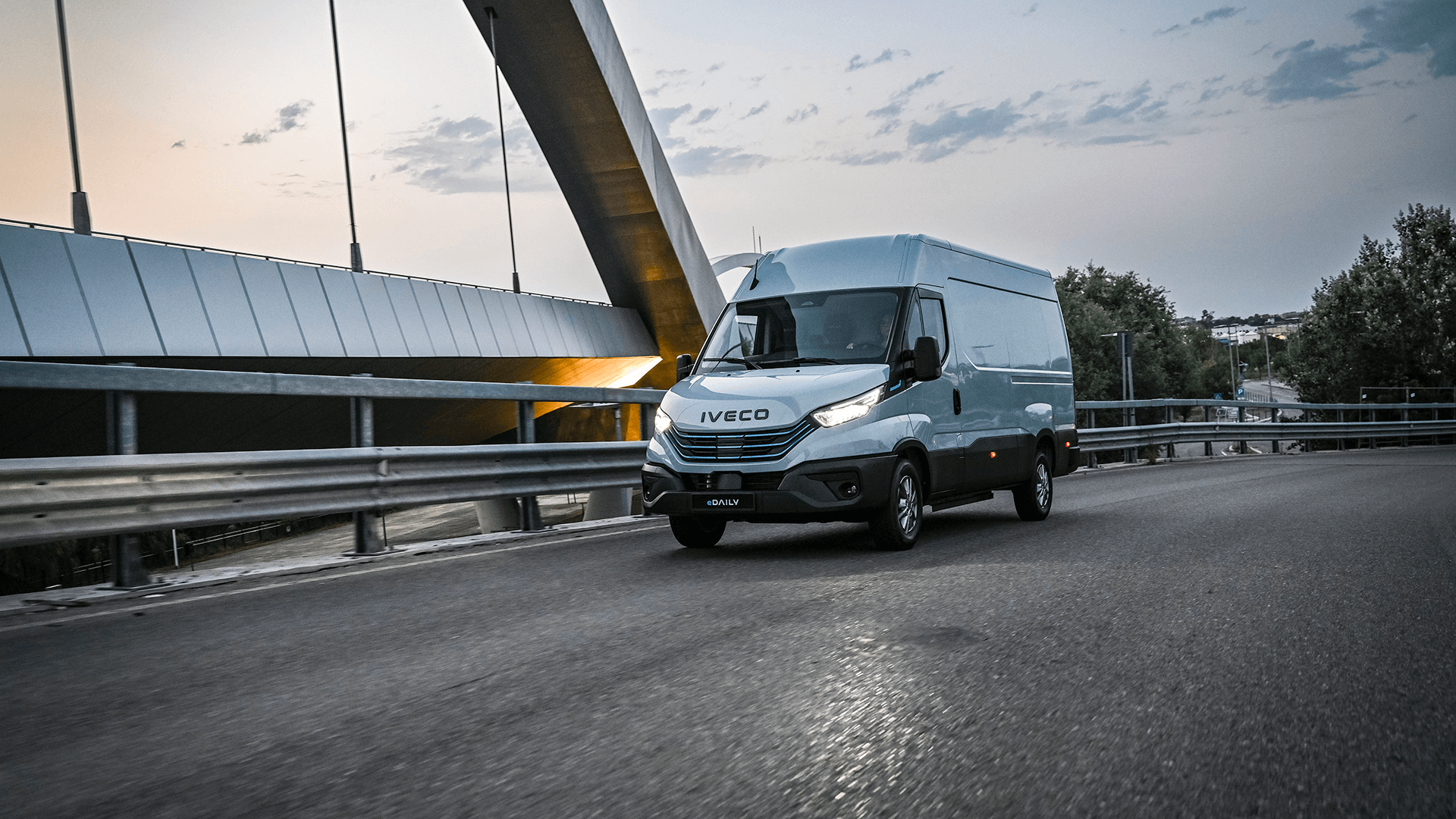 IVECO eDaily driving across bridge.